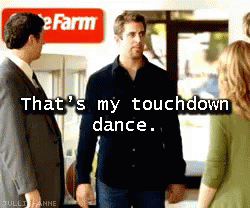 Man Standing in Front of Touchdown Dance Sign