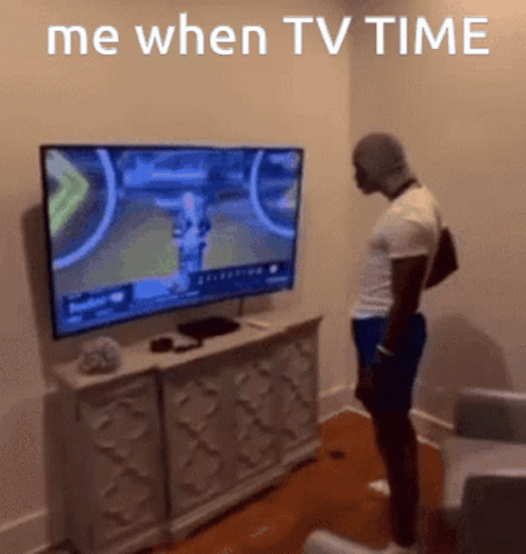 Man Standing In Front Of TV Saying Me When TV Time GIF