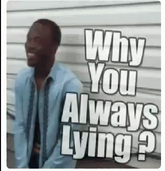 Man Standing in Front of Wall Saying Why You Always Lying