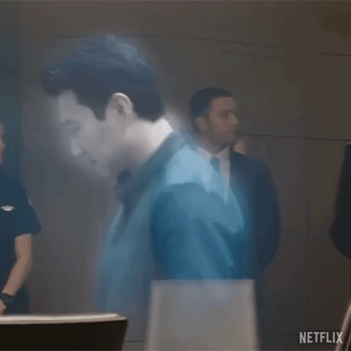 Man Standing in Front of Wall With Ghostly Image
