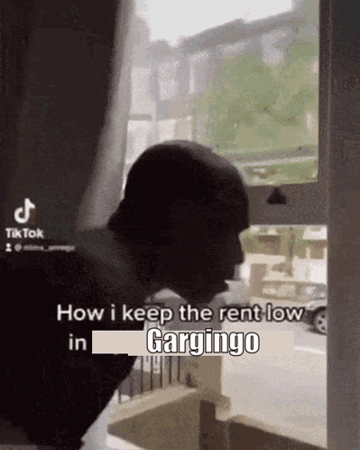 Man Standing In Front Of Window GIF