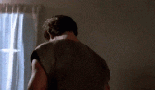 Man Standing In Front Of Window GIF