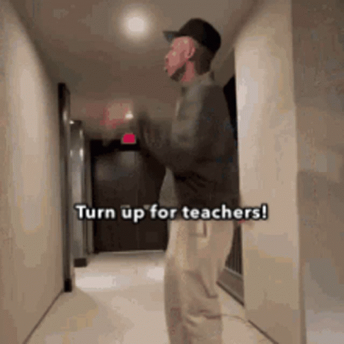 Man Standing in Hallway Turn Up for Teachers