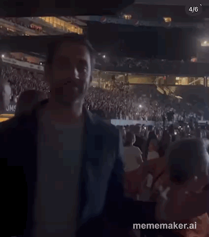 Man Standing In Stadium Crowd GIF