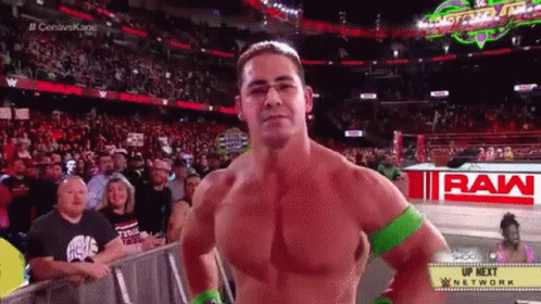 Man Standing in Wrestling Ring