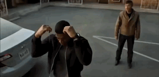 Man Standing Next To Car In Parking Lot GIF