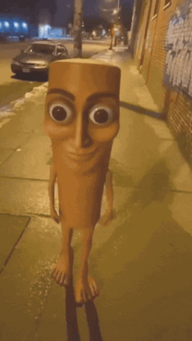 Man Standing Next to Cartoon Character on Street