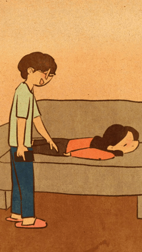 Man Standing Next to Couch with Lying Woman
