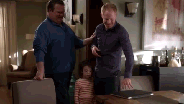 Man Standing Next To Little Girl In Living Room GIF