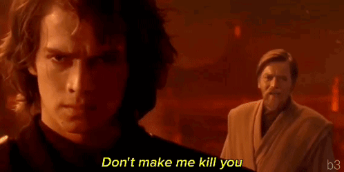 Man Standing Next to Man With Don't Make Me Kill You