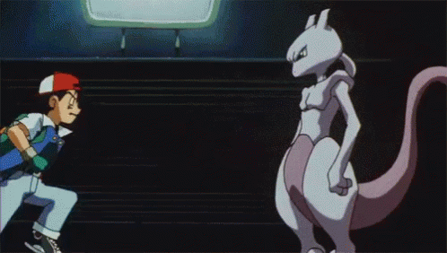 Man Standing Next to Purple Pokemon