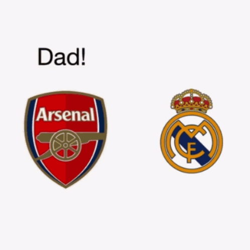 Man Standing Next to Real Madrid Logo