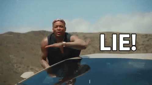 Man Standing on Car Roof Saying Lie