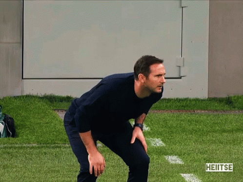 Man Standing On Field With Heitse Text GIF