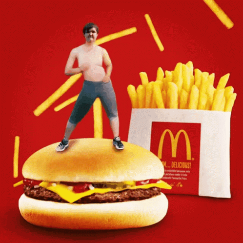 Man Standing on McDonald's Hamburger