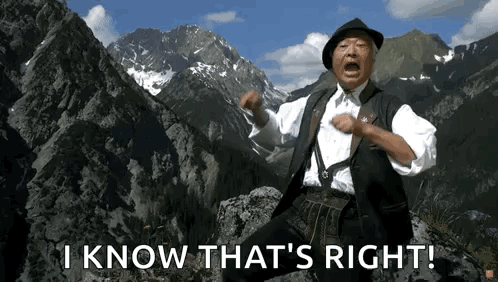 Man Standing on Mountain Saying I Know That's Right