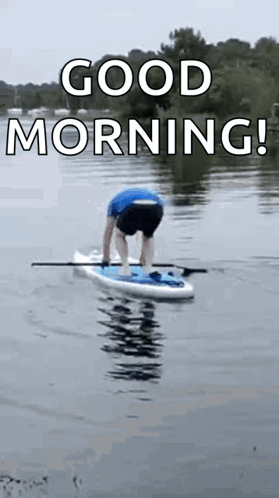 Man Standing on Paddle Board Saying Good Morning