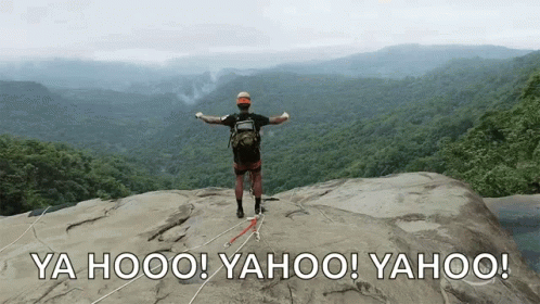 Man Standing On Rock Saying Yahoo GIF