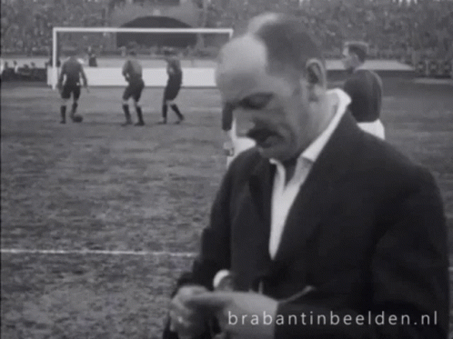 Man Standing On Soccer Field GIF