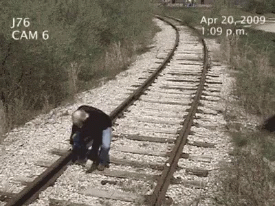 Man Standing on Train Tracks April 20 2009