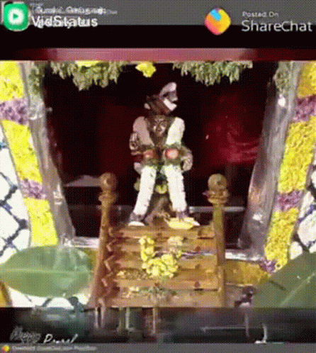 Man Statue on Wooden Temple Staircase