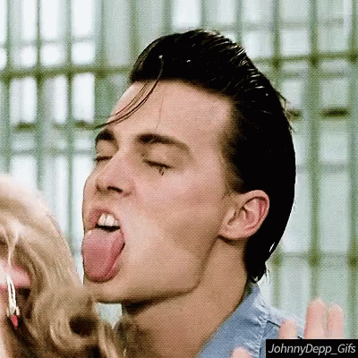 Man Sticking Tongue Out With Johnny Depp GIF