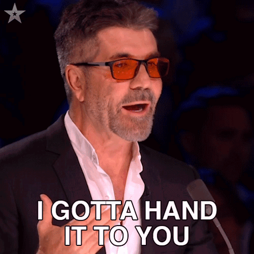Man Suit Glasses Says I Gotta Hand It to You