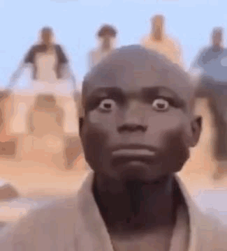 Man Surprised In Front Of Crowd GIF