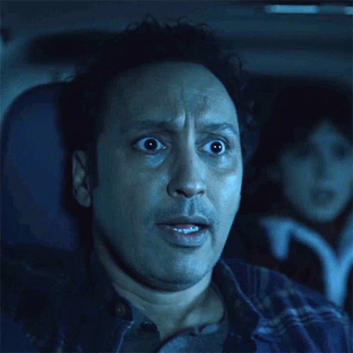 Man Surprised Sitting in Car