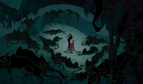 Man Surrounded by Black Animals