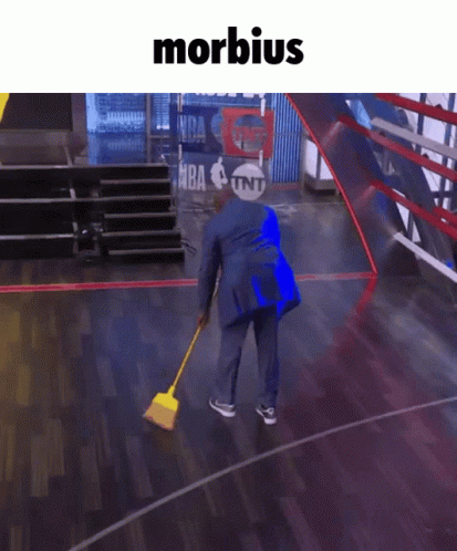 Man Sweeping Basketball Court Morbidus