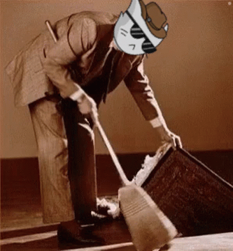 Man Sweeping Floor with Broom