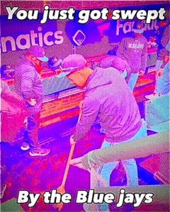 Man Sweeping Floor With Sign