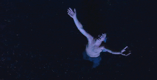 Man Swimming With Arms Outstretched GIF