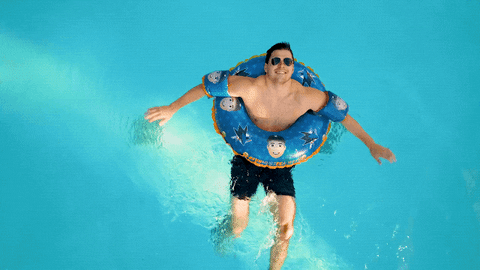 Man Swimming With Floaties GIF