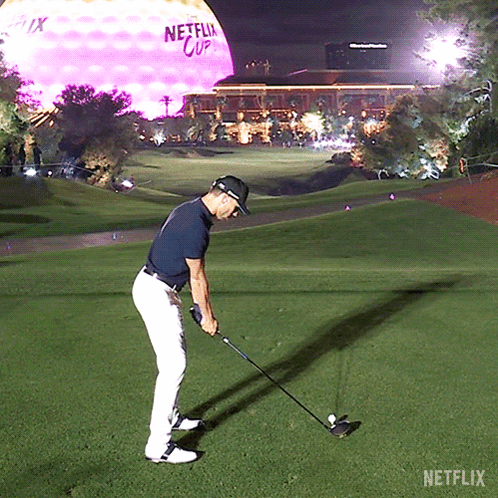 Man Swinging Golf Club GIF