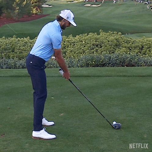 Man Swinging Golf Club GIF