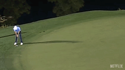 Man Swinging Golf Club GIF