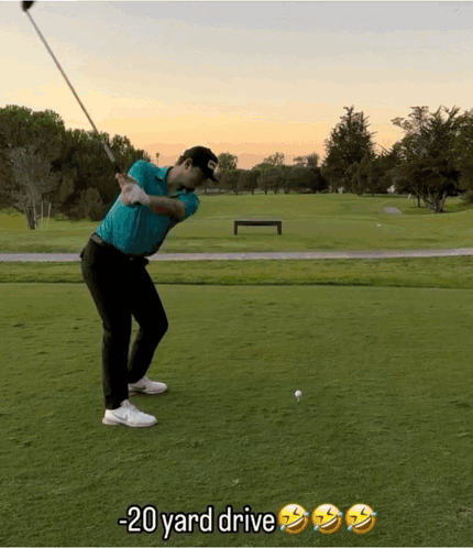 Man Swinging Golf Club with -20 Yard Drive