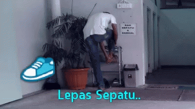 Man Take Off His Bush Shoe GIF
