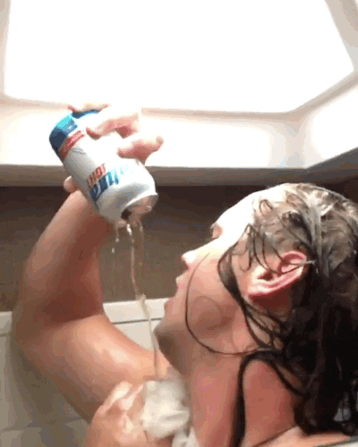 Man Taking A Bath While Drinking Beer GIF