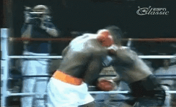Man Taking Photo Of Boxers In Ring GIF