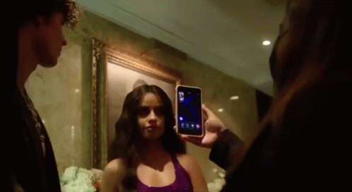Man Taking Picture of Woman It's Giving Cher