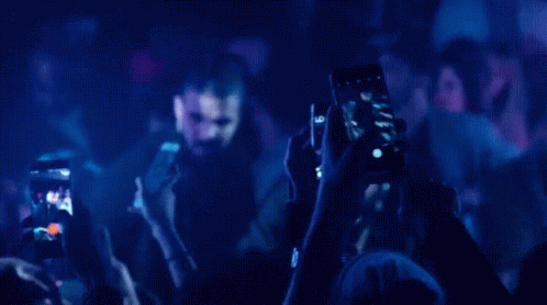 Man Taking Selfie at Party
