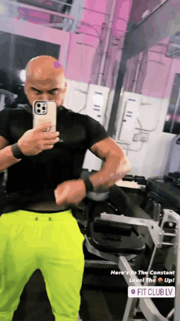 Man Taking Selfie in Gym