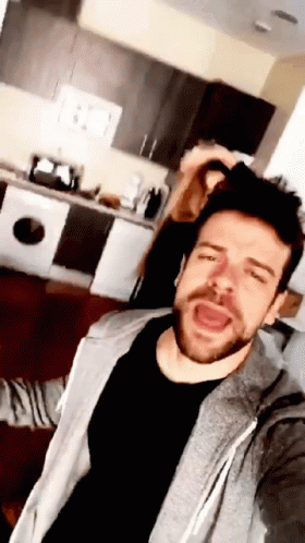 Man Taking Selfie with Open Mouth