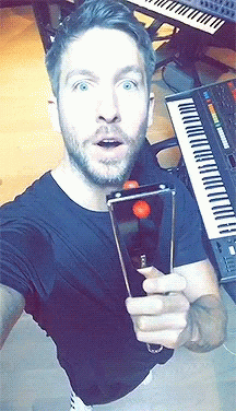 Man Taking Selfie With Piano
