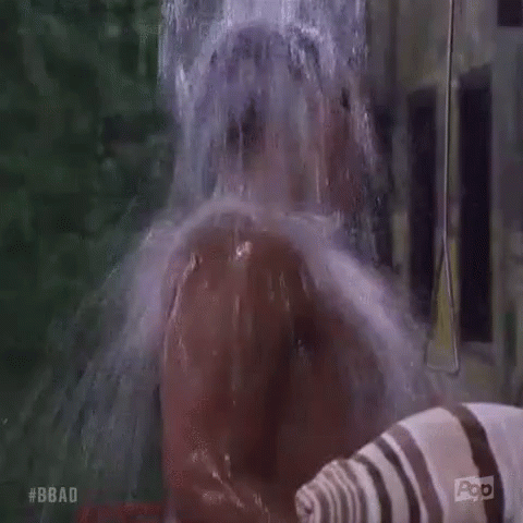 Man Taking Shower With Water Spraying