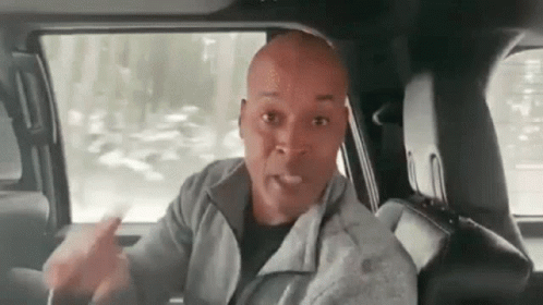 Man Talking In Car Back Seat GIF