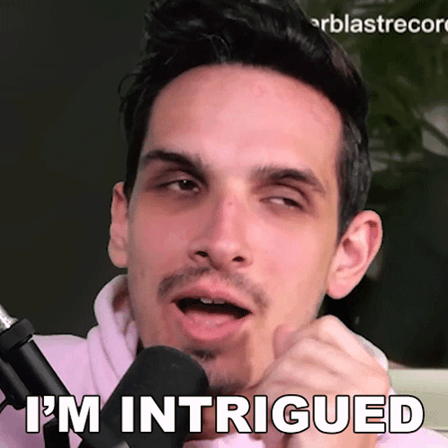 Man Talking Into Mic Saying I'm Intrigued